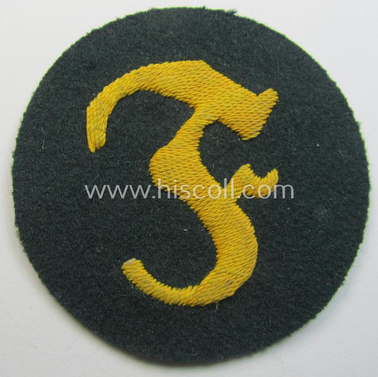 WH (Heeres) so-called: trade- and/or special-career arm-insignia (ie. 'Laufbahn- o. Tätigkeitsabzeichen') as was specifically intended for an army: 'Feuerwerker' (being a neatly hand-embroidered variant on darker-green-coloured wool)