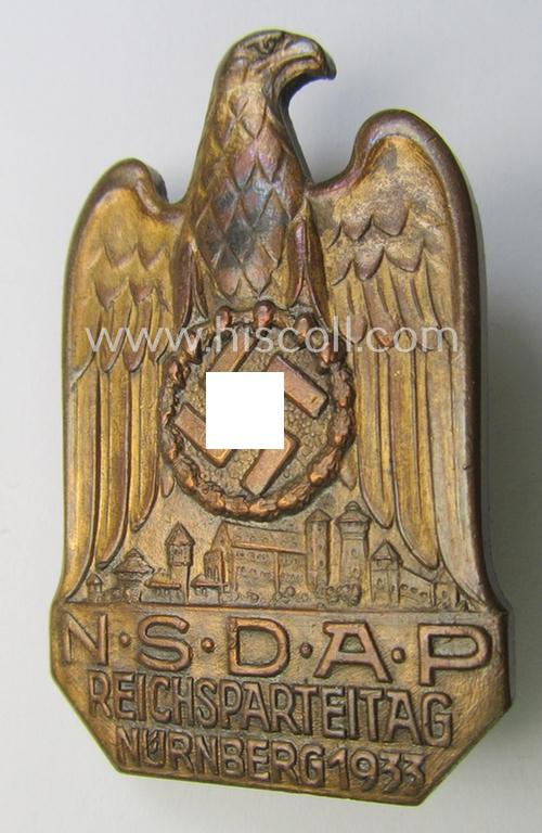 Attractive, N.S.D.A.P.-related 'tinnie' (ie. 'Tagungs- o. Veranstaltungsabzeichen'-) being a maker- (ie. 'C. Balmberger'-) marked- and golden-bronze-toned example showing the text: 'N.S.D.A.P. Reichsparteitag - Nürnberg 1933'