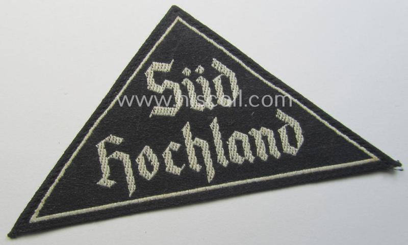 'HJ' ('Hitlerjugend') ie. 'BDM'- ('Bund Deutscher Mädel') district-triangle (ie. 'Gebietsdreieck') entitled: 'Süd Hochland' (being a minimally used- ie worn example that still shows a part of its period 'RzM'-etiket)
