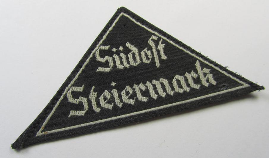 Neat, 'HJ' ('Hitlerjugend') ie. 'BDM' ('Bund Deutscher Mädel') district-triangle (ie. 'Gebietsdreieck') entitled: 'Südost Steiermark' still retaining its period-attached-, paper-based so-called: 'RzM'-etiket