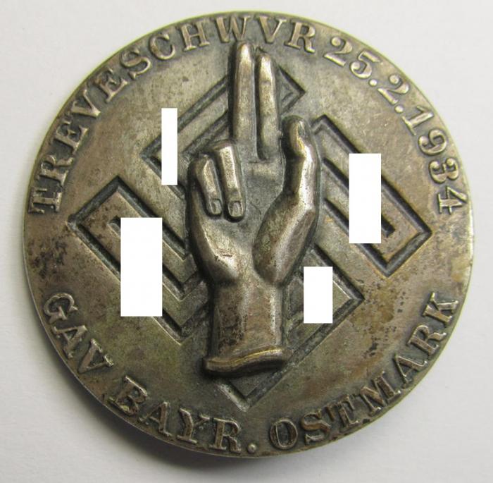 Commemorative - 'Buntmetall'-based-, N.S.D.A.P.-related 'tinnie', being a maker- (ie. 'Wächtler u. Lange'-) marked example depicting an oath-taking hand above a swastika surrounded by the text: 'Treueschwur 25-2-1934 - Bayr. Ostmark'