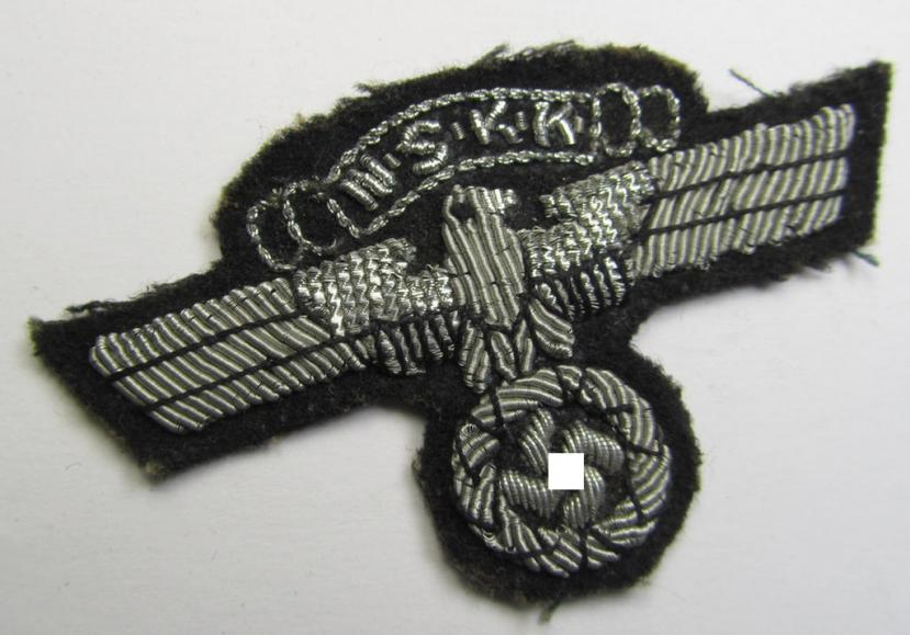 Superb, N.S.K.K.- (ie. 'National Socialistischer Kraftfahr Korps') officers'-pattern, visor-cap eagle (ie. 'Adler für Schirmmütze') being a neatly hand-embroidered example