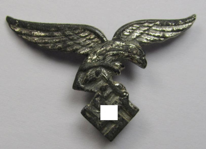 Bright-silver-toned lapel-pin (ie. 'Zivilabzeichen') to be worn on the civil attire as was intended for usage by the various staff-members of the 'Luftwaffe' (depicting an early-pattern- ie. 'down-tailed'-eagle)