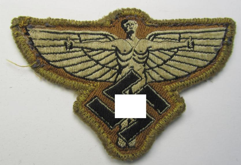 Tan-coloured, so-called: N.S.F.K.- (or: 'National Socialistisches Flieger Korps') breast-eagle being a nicely woven- (and enlisted-mens'-pattern) example that comes mounted on its piece of tan-coloured wool