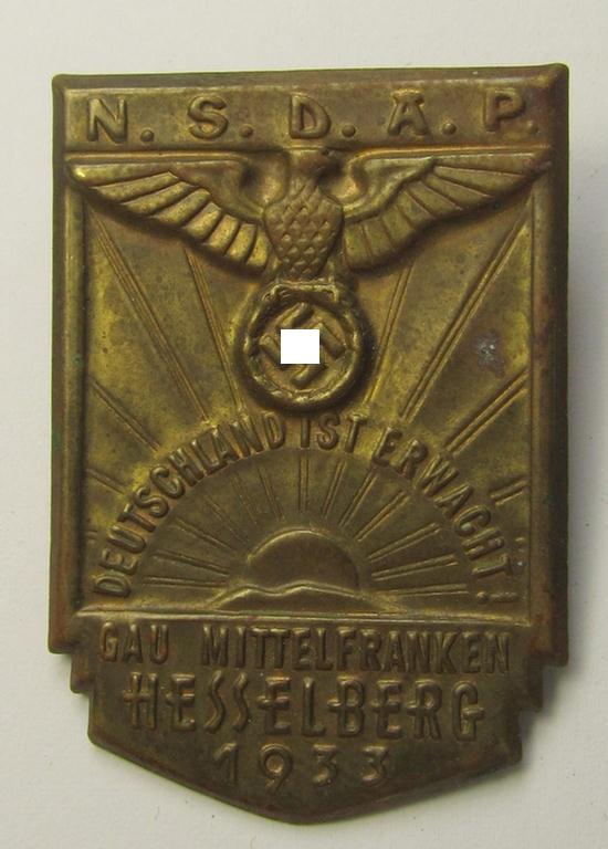 Detailed, early-period, golden-bronze-toned N.S.D.A.P.-related day-badge (ie. 'tinnie' or: 'Veranstaltungsabzeichen') as was issued to commemorate a party-related meeting: 'N.S.D.A.P. - Gau Mittelfranken - Hesselberg - 1933'