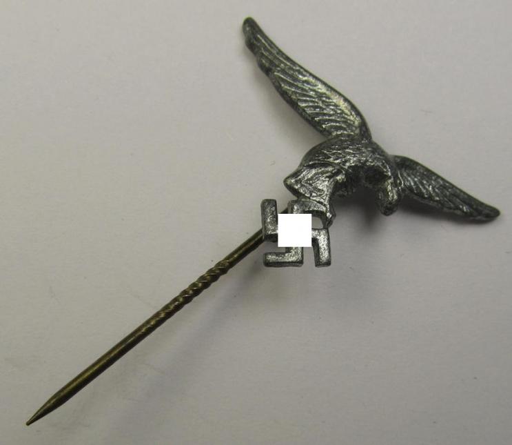 Greyish-silver-toned lapel-pin (ie. 'Zivilabzeichen') to be worn on the civil attire as was intended for usage by the various staff-members of the 'Luftwaffe' (depicting an early-pattern- ie. 'down-tailed'-eagle)