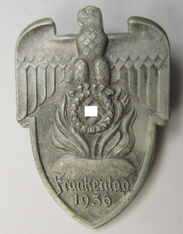 Greyish-silver-toned- and/or zinc-based, so-called: N.S.D.A.P.-related 'tinnie' (ie. 'Tagungs- o. Veranstaltungsabzeichen'-) being a maker- (ie. 'Lauer - Nürnberg-Berlin'-) marked example showing the text: 'Frankentag - 1936'