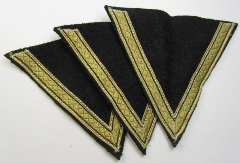 Waffen-SS-type 'Armwinkel' (or: rank-chevron) as executed on black-coloured wool as was specifically intended for usage by an SS-soldier with the rank of: 'SS-Sturmmann'