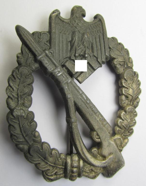 Superb, 'hollow-back' 'Infanterie Sturmabzeichen in Silber' (or: silver infantry assault badge ie. IAB) being a non-maker-marked example as executed in zinc-based metal (ie. 'Feinzink') as was produced by the: 'Berg & Nolte'-company