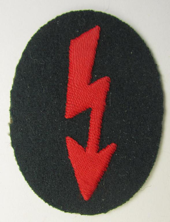 WH (Heeres) trade- and/or special-career-insignia ie. hand-embroidered 'signal-blitz' being a nicely maker-marked example as executed in bright-red linnen as was specifically intended for a soldier within the: 'Artillerie-Truppen'