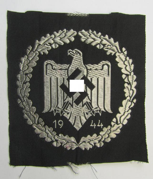 Neat, silver-class sports-shirt-patch that is dated: '1944' as was executed in neat 'BeVo'-weave pattern as was used by the members of the: 'Nationalsozialistischer Reichsbund für Leibesübungen' (ie. 'N.S.R.L.')