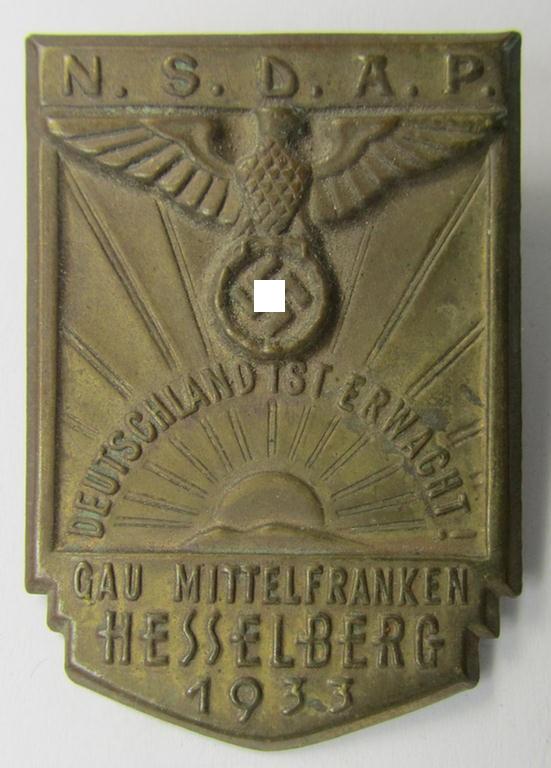 Detailed, early-period, golden-bronze-toned N.S.D.A.P.-related day-badge (ie. 'tinnie' or: 'Veranstaltungsabzeichen') as was issued to commemorate a party-related meeting: 'N.S.D.A.P. - Gau Mittelfranken - Hesselberg - 1933'