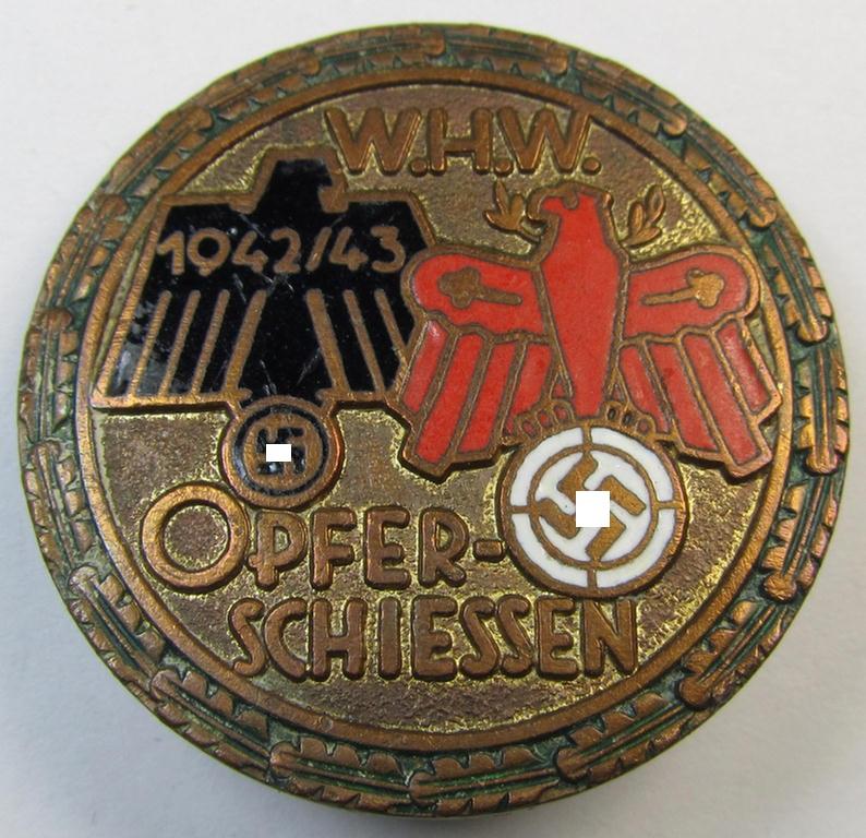 Attractive, WHW- (ie. 'Winterhilfswerke'-) related day-badge (ie. 'tinnie') or: 'Veranstaltungsabzeichen des Standschützenverbandes Tirol-Vorarlberg' depicting the text: 'W.H.W. Opferschiessen 1942/43'