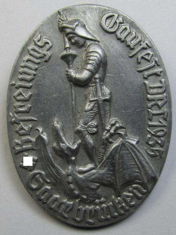 Attractive, aluminium-based- and/or: bright-silvered-toned (and maker-marked!) N.S.D.A.P.-related 'tinnie' showing a detailed knight and dragon surrounded by the text: 'Befreiungs Gaufest DRL 1935 - Saarbrücken'