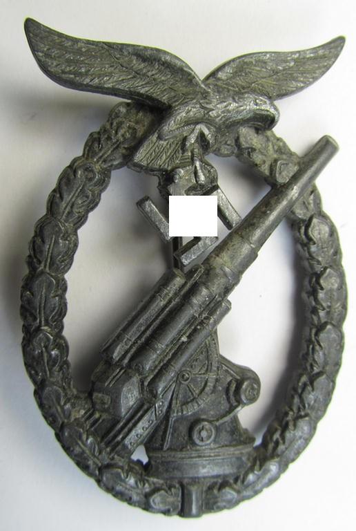 Later-war period- and/or: zinc- (ie. 'Feinzink'-) based- example of a maker- (ie. 'WH'-) marked, WH (Luftwaffe) 'Flakkampfabzeichen' (or: airforce anti-aircraft badge), as was produced by the desirable: 'Wilhelm Hobacher'-company