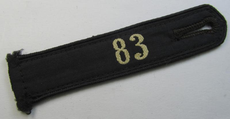 Neat - and naturally single! - black-piped, so-called: 'DJ- o. Deutsches Jungvolk' shoulderstrap as was intended for usage by a: 'DJ-Mitglied' who served within the: 'Bann 83' (83 = 'Kassel')