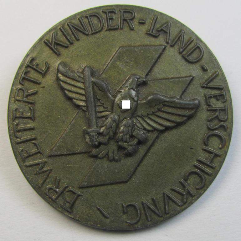 Superb, commemorative and greyish-silver-coloured, 'DJ'- (ie. 'Deutsches Jungvolk'-) related 'award' being a non-maker marked example, depicting an eagle-device and 'DJ'-rune surrounded by the text: 'Erweiterte Kinderlandverschickung'