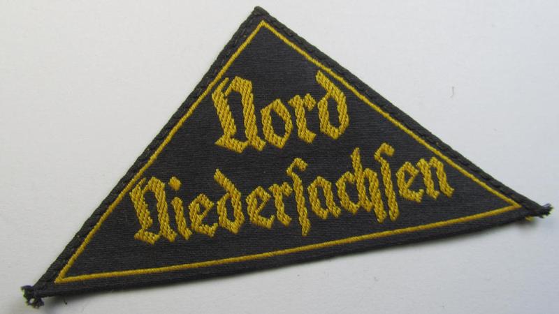 'HJ' ('Hitlerjugend') district-triangle (ie. 'Gebietsdreieck') entitled: 'Nord Niedersachsen' (being a minimally used- and/or worn example that has lost its once-attached 'RzM'-etiket)