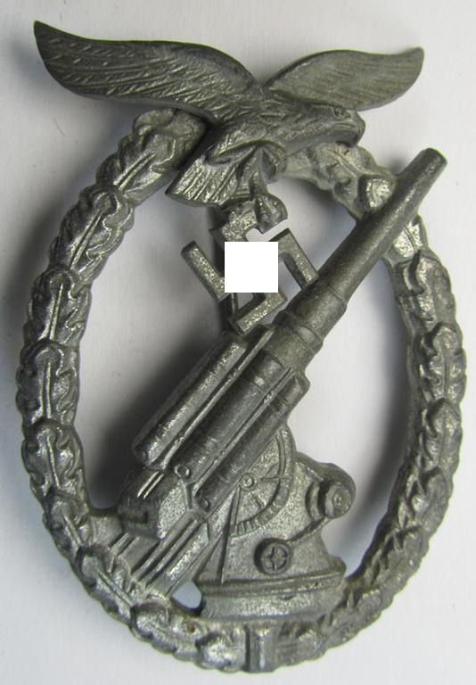 Attractive - and just moderately used! - 'Feinzink'-based example of a WH (Luftwaffe) 'Flakkampfabzeichen' (or: airforce anti-aircraft badge) being a very detailed albeit non-maker-marked example as was produced by the: 'E. Ferd. Wiedmann'-company