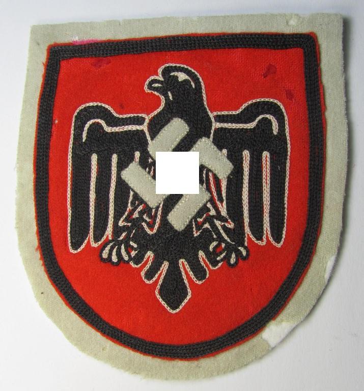Attractive example of a neatly embroidered NSRL- (ie. 'NS Reichsbund für Leibesübungen'-related sports'-tunic-patch as was specifically intended for usage on the various shirts and/or tunics during the Berlin Olympic Games held in 1936