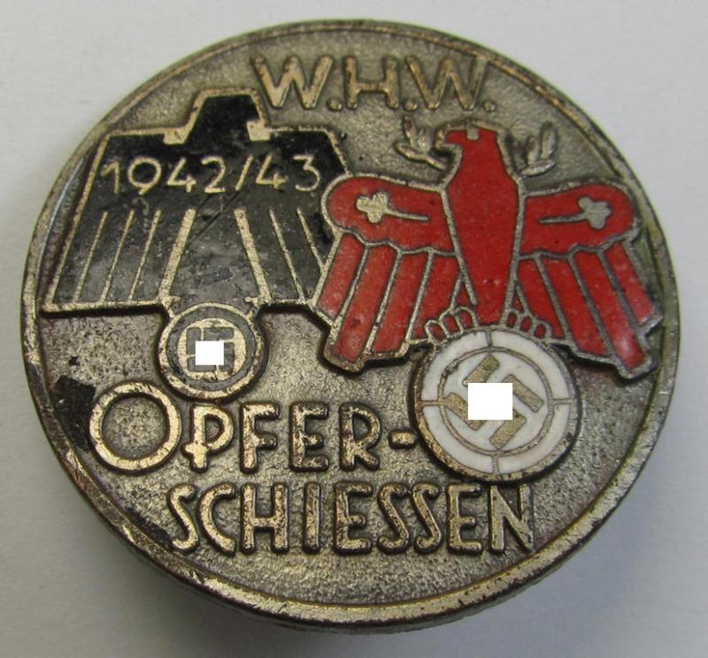 Attractive, WHW- (ie. 'Winterhilfswerke'-) related day-badge (ie. 'tinnie') or: 'Veranstaltungsabzeichen des Standschützenverbandes Tirol-Vorarlberg' depicting the text: 'W.H.W. Opferschiessen 1942/43'