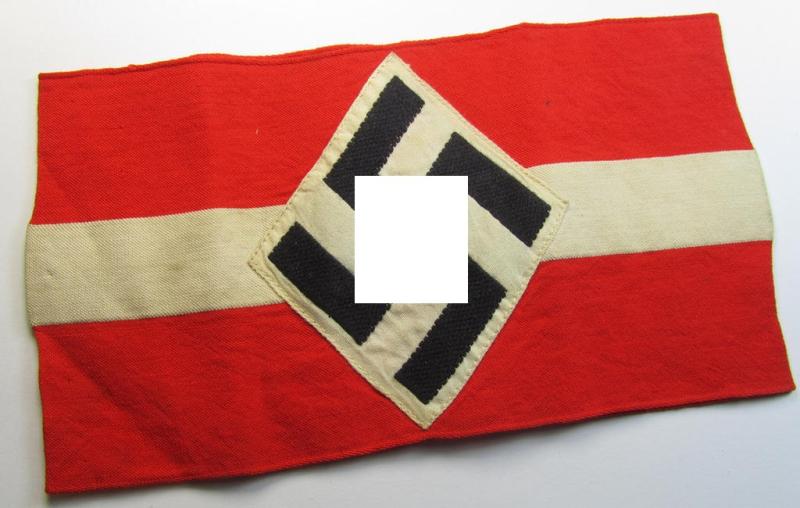 Attractive - and nowadays scarcely found! - 'standard'- (ie. entirely woven) pattern, bright-red-coloured HJ- (ie. 'Hitlerjugend'-) related armband (ie. 'Armbinde') being a hardly worn- ie. used example that regrettably misses its 'RzM'-etiket