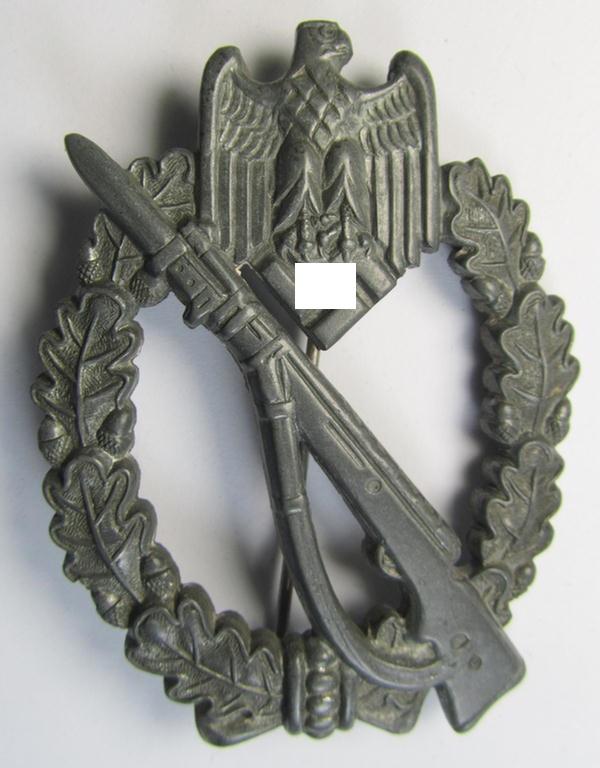 Attractive - and moderately used! - 'Infanterie-Sturmabzeichen in Silber' (or: silver-class infantry-assault badge ie. IAB) being a neatly maker- (ie. 'MK 1'- or: 'Metall u. Kunststoff'-) marked example as executed in silverish-coloured 'Feinzink'