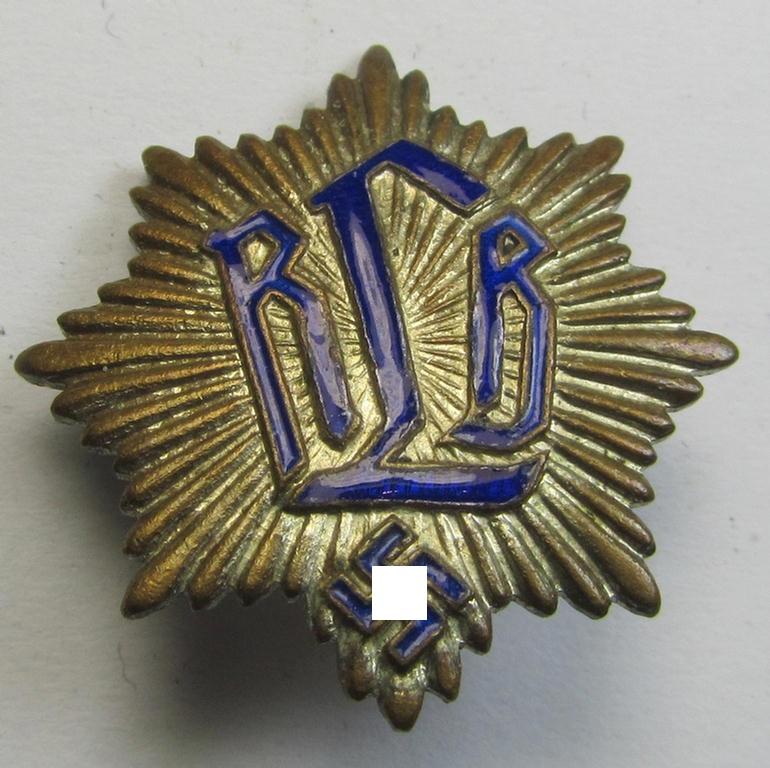 Semi-enamelled RLB- (ie. 'Reichluftschützbund') 'Zivilabzeichen' or: civil-attire badge (of the first pattern) that is void of a makers'-designation but that is bearing a patent-pending- (ie. 'Ges.Gesch.'-) marking on its back