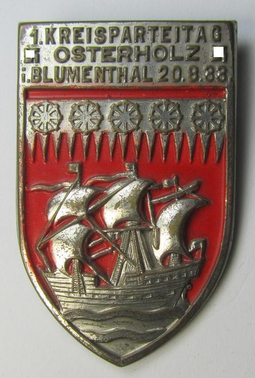 Attractive, bright silverish-toned- (and/or typical zinc-based) N.S.D.A.P.-related day-badge (ie. 'tinnie' or: 'Veranstaltungsabzeichen') as was issued to commemorate the: '1.Kreisparteitag - Osterholz i. Blumenthal - 20-8-33'