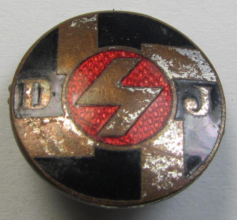 Attractive, multi-coloured- and nicely enamelled membership-lapel-pin (ie. 'Mitgliedsabzeichen' as was intended to signify membership within the: 'DJ' (or: 'Deutsches Jungvolk in der HJ') being a neat, non-maker-marked specimen of the 1st pattern