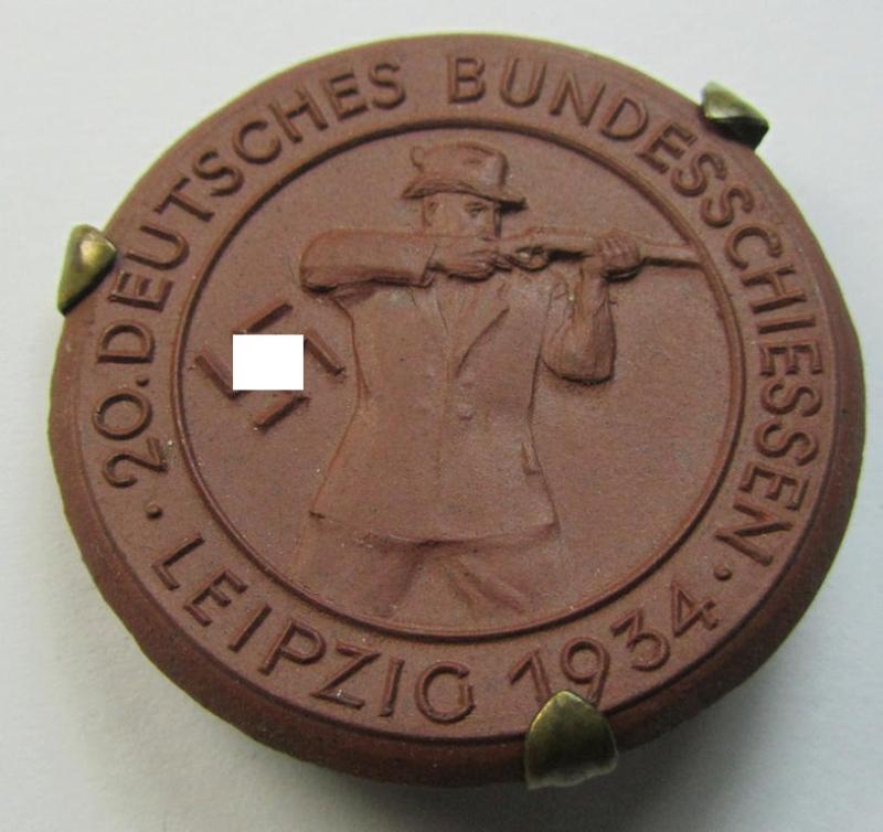 Attractive - and not that often encountered! - brownish-red-toned- and/or: 'Meissen'-porcelain-based, so-called: 'Erinnerungs-Medaille' bearing a portrait of a hunter coupled with the text: '20. Deutsches Bundesschiessen - Leipzig - 1934'