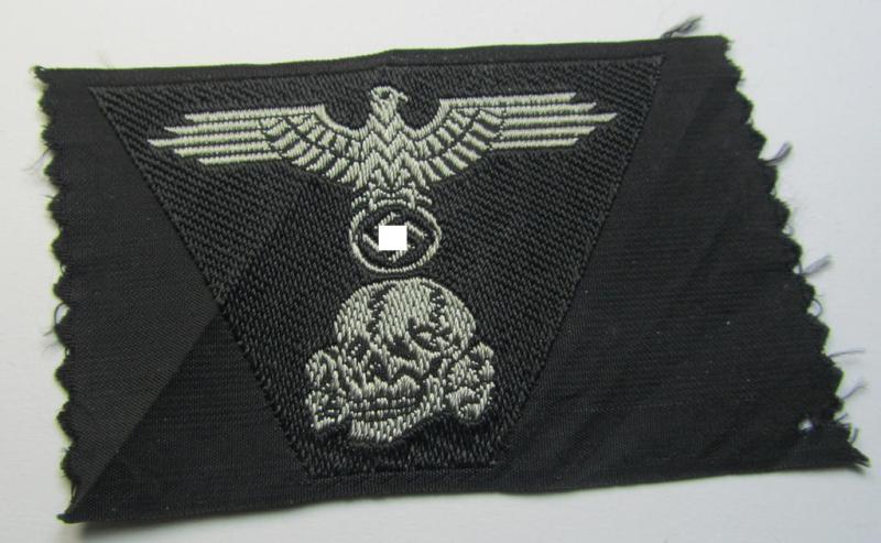 Attractive, Waffen-SS black-coloured M43-pattern 'Panzer'-cap-trapezoid as executed in 'BeVo'-weave-pattern as was specifically intended for usage on the M43-model field-caps (ie. 'Einheitsfeldmützen')
