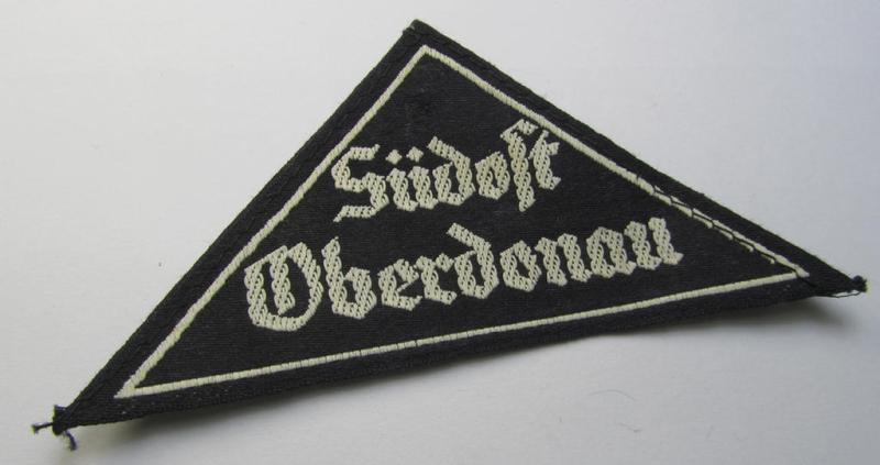 'HJ' ('Hitlerjugend') ie. 'BDM' ('Bund Deutscher Mädel') district-triangle (ie. 'Gebietsdreieck') entitled: 'Südost Oberdonau' still retaining its period-attached, paper-based so-called: 'RzM'-etiket