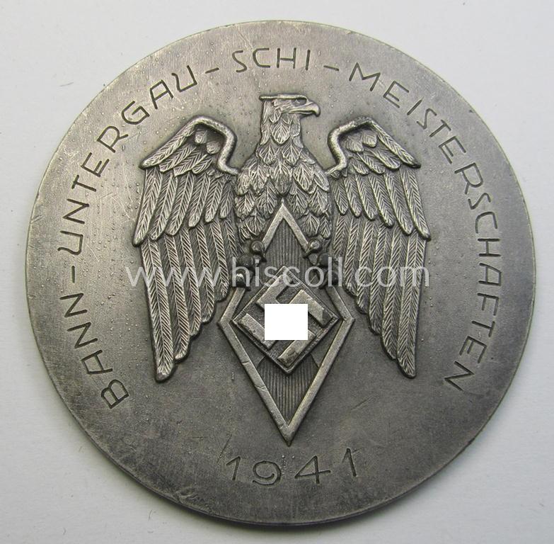 Superb, silver-toned 'HJ'- ('Hitlerjugend') ie. 'BDM'- ('Bund Deutscher Mädel') related commemorative-plaque (ie. 'Erinnerungs- o. nichttragbare Plakette') entitled: 'Bann - Untergau - Schi-Meisterschaften - 1941 - BDM Klasse A - 1. Sieg'