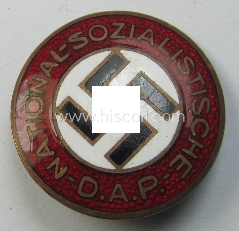 Attractive - bright-red-coloured- and I deem early-period! - 'N.S.D.A.P.'-membership-pin- ie. party-badge (or: 'Parteiabzeichen') being a non-maker-marked specimen that bears a: 'Ges.Gesch.'-patent-pending-designation