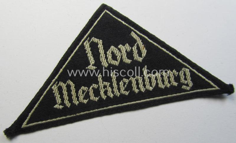 Superb - and rarely seen! - 'HJ' ('Hitlerjugend') ie. 'BDM' (or: 'Bund Deutscher Mädel') district-triangle (ie. 'Gebietsdreieck') entitled 'Nord Mecklenburg' (being a used- ie. once tunic-attached example that misses its 'RzM'-etiket)