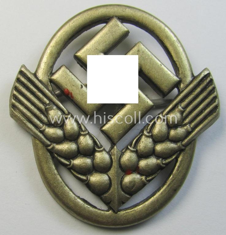Attractive - and scarcely encountered! - silverish-golden-toned - and I deem aluminium-based - cap-badge (ie. 'Hutabzeichen') as was intended for usage by a female member serving within the: 'Reichsarbeitsdienst der weiblichen Jugend' (or: RADwJ)