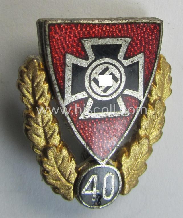 Honorary-membership lapel-pin (aka: 'Goldene Ehrennadel für 40 Jahre Mitgliedschaft im Nationalsocialistischer Reichskriegerbund' (ie. 'N.S.R.K.B.') being a maker- (ie. '5'-) marked example that bears a: 'Ges.Gesch.'-designation on its back