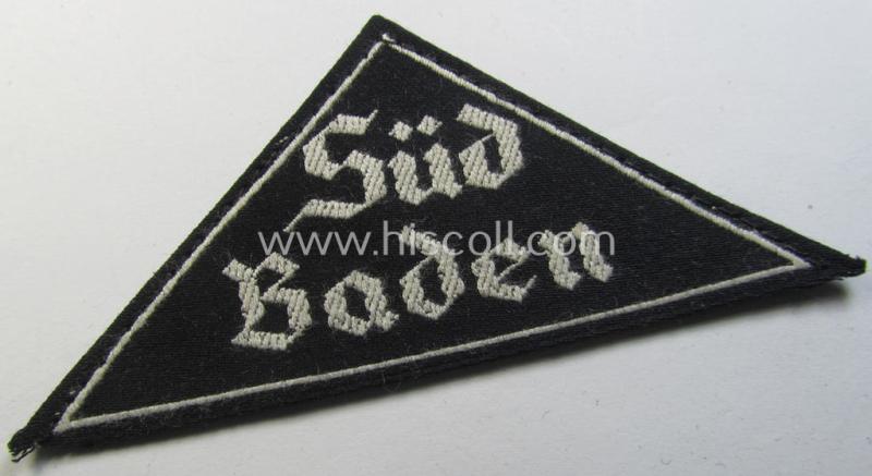 'HJ' ('Hitlerjugend') ie. 'BDM'- ('Bund Deutscher Mädel') district-triangle (ie. 'Gebietsdreieck') entitled: 'Süd Baden' (being a simply never used- nor worn example that still retains its period-attached 'RzM'-etiket)