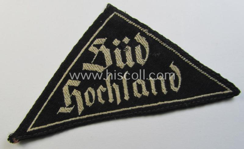 'HJ' ('Hitlerjugend') ie. 'BDM'- ('Bund Deutscher Mädel') district-triangle (ie. 'Gebietsdreieck') entitled: 'Süd Hochland' (being a clearly used- ie worn example that regrettably misses its 'RzM'-etiket)