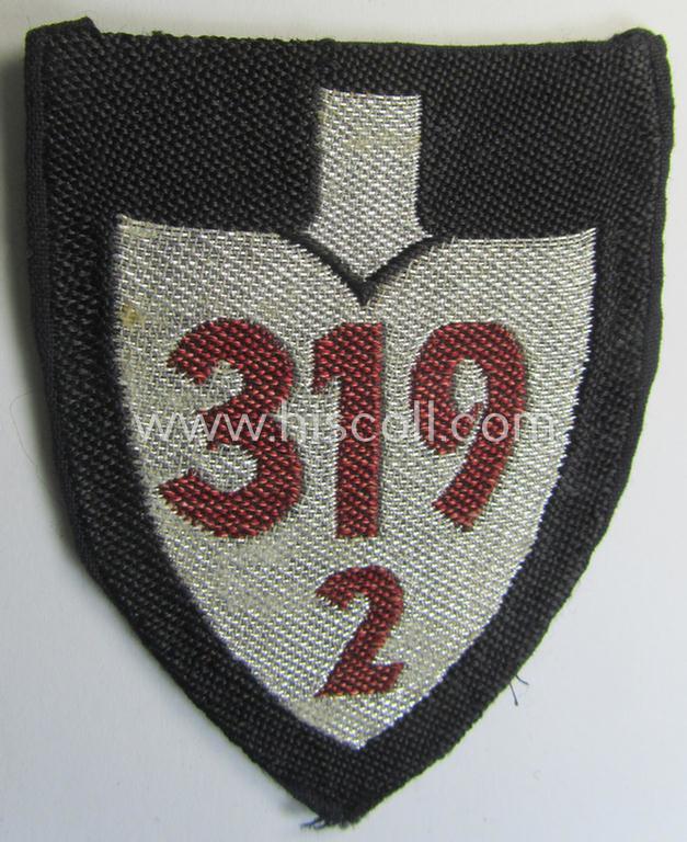 Attractive, officers'-pattern so-called: RAD (ie. 'Reichsarbeitsdienst') sleeve-badge (or: 'Dienststellenabzeichen') bearing the specialist- (ie. unit-) designation that reads: '319/2'