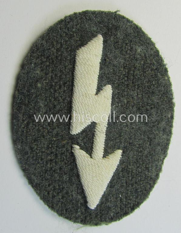 Used- and/or tunic-removed WH (Heeres) trade- and/or special career insignia ie. hand-embroidered signal-blitz (being a neatly maker-marked example as executed in white) as was intended for a soldier serving within the: 'Infanterie-Truppen'