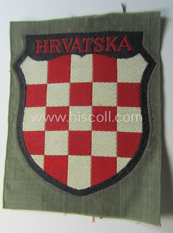 Superb, multi-coloured- and/or 'BeVo'-woven armshield (ie. 'Ärmelschild') entitled: 'Hrvatska' as was intended for usage by a volunteer who served within the 'Deutsche Wehrmacht' ie. within the 'Kroatische Legion'