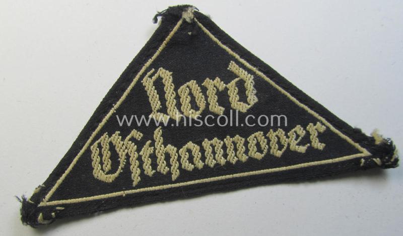 Superb - and truly rarely found! - 'HJ' ('Hitlerjugend') ie. 'BDM' ('Bund Deutscher Mädel'-) district-triangle (ie. 'Gebietsdreieck') entitled: 'Nord Osthannover' (being a clearly used- ie. worn example that has lost its 'RzM-etiket')