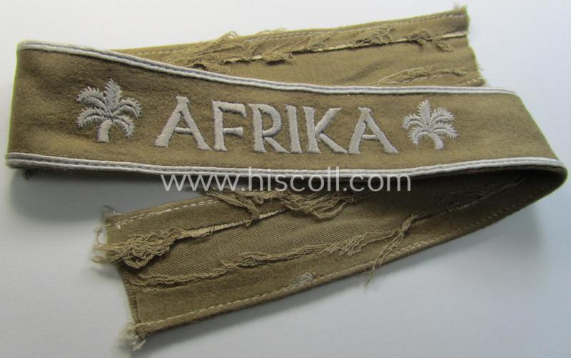 Attractive, WH (LW o. Heeres) cuff-title (ie. 'Ärmelstreifen') entitled: 'Afrika' (being an example that comes in a presumably issued- albeit simply never used- ie. 'virtually mint' condition)
