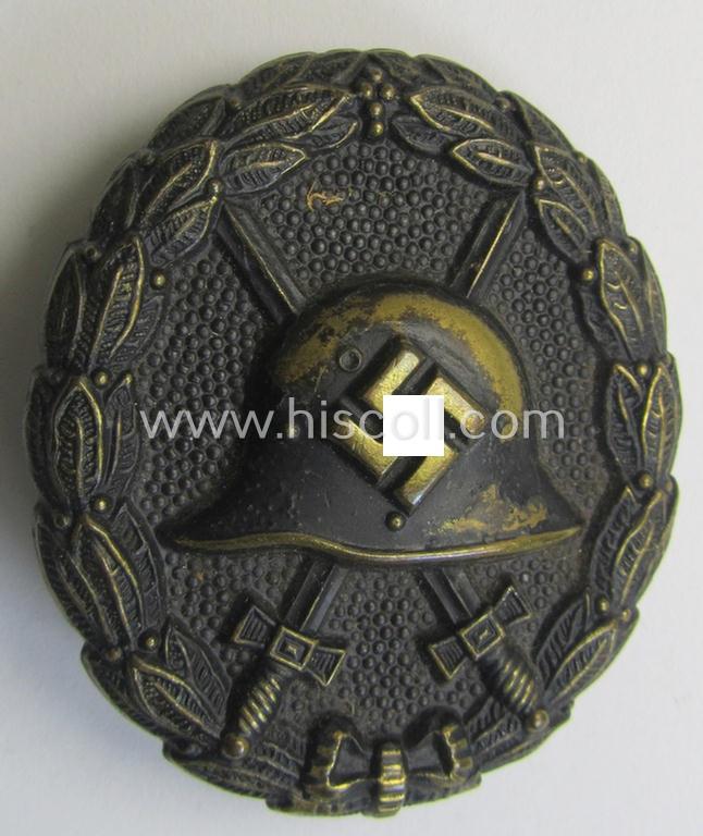 Attractive, early-pattern, black-class wound-badge (ie.: 'Verwundeten Abzeichen in Schwarz') being a detailed so-called: 'Spanish Civil-War'-version that comes in a moderately used- and/or worn, condition