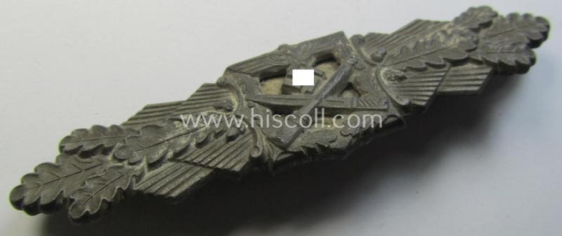 'Nahkampfspange in Bronze' (or: bronze-class close-combat clasp ie. CCC) being a maker- (ie. 'FLL'-) marked- and/or non-converse-shaped so-called: '3rd pattern'-specimen as was produced by the maker- (ie. 'Hersteller') 'Friedrich Linden'