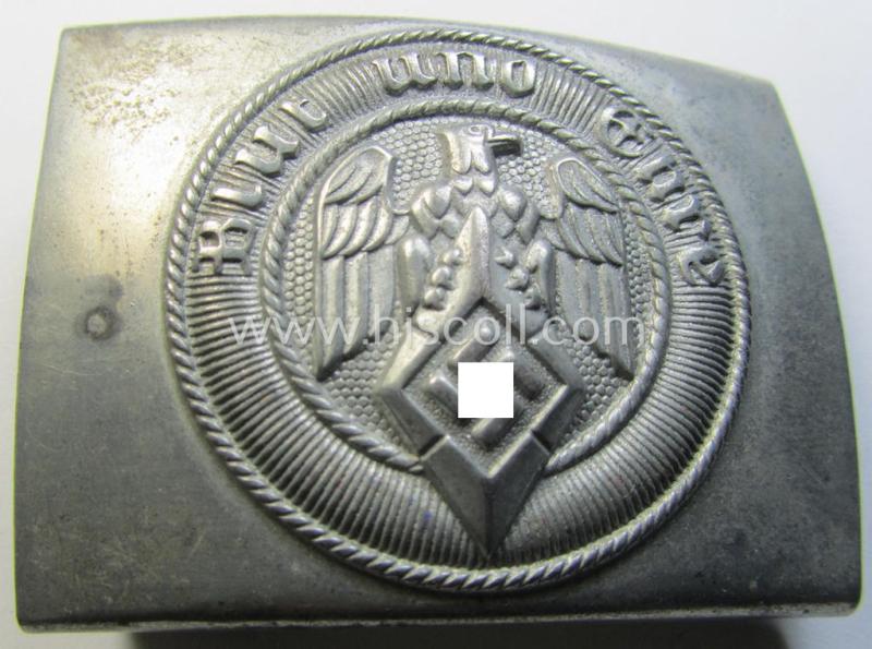 Attractive, HJ (ie. 'Hitlerjugend') silver-coloured- (ie. typically steel-based and 'off-factory'-polished) belt-buckle being a neatly maker- (ie. 'RzM M4/110'-) marked example that comes in a just moderately used- ie. worn condition, as found