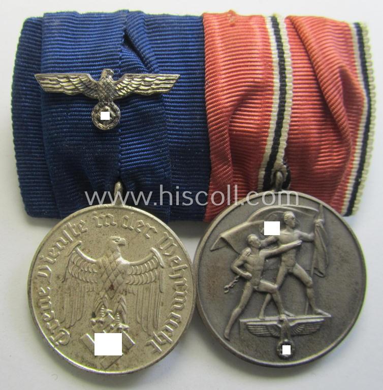 Attractive example of a two-pieced medal-bar (ie.: 'Doppel- o. Ordenspange') resp. showing a: 'WH-DA 4. Stufe' (with firmly attached eagle-device) and an Austrian 'Anschluss'-medal '1 März 1938'