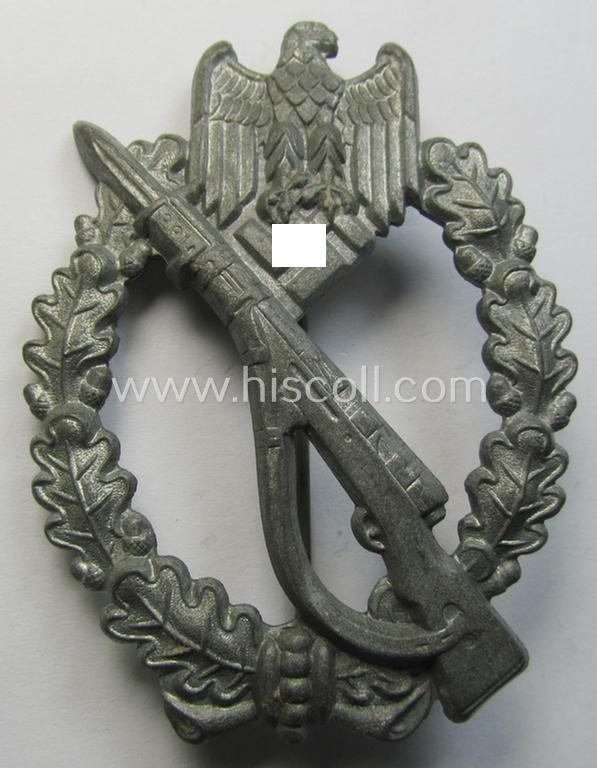 'Infanterie Sturmabzeichen in Silber', being an unmarked (and/or very converse- ie. vaulted-) 'hollow-back' example by the maker: 'Friedrich Linden' (ie. 'F.L.L.') as was executed in silver-coloured, zinc-based metal (ie. 'Feinzink')